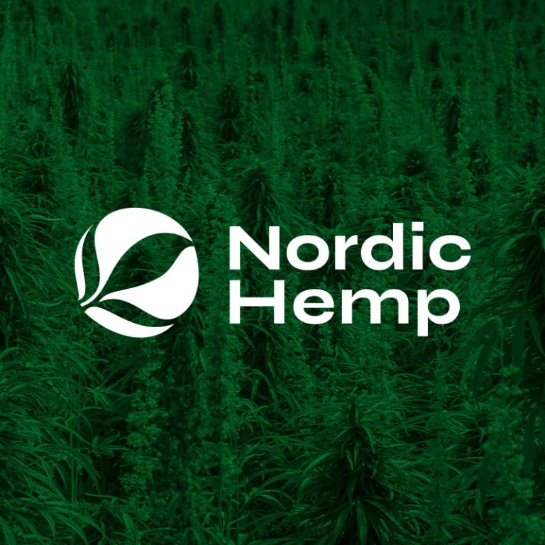Nordic Hempi logo tumeroheliste kanepilehtede taustal